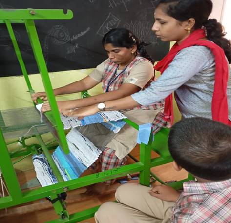 Student practising weaving and loom-based vocational training