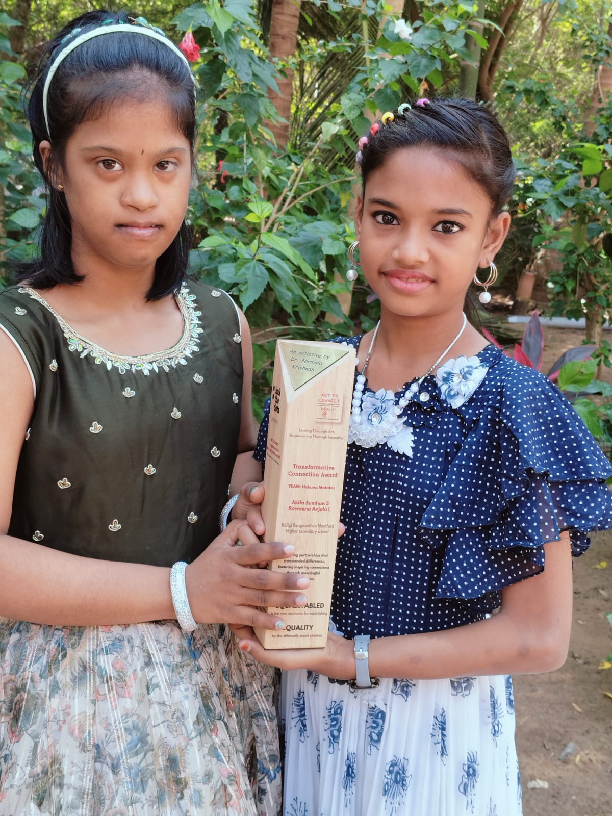 KRM Special School students holding the Transformative Connection Award